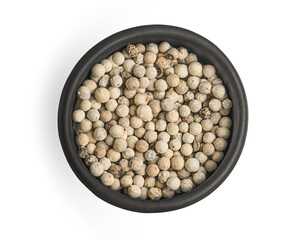 White pepper seeds in a wooden bowl isolated