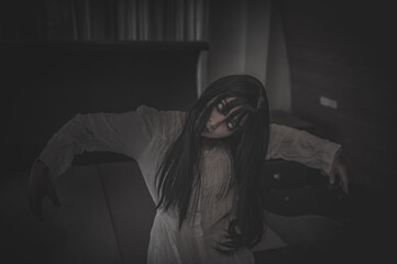 Portrait of asian woman make up ghost,Scary horror scene for background,Halloween festival...