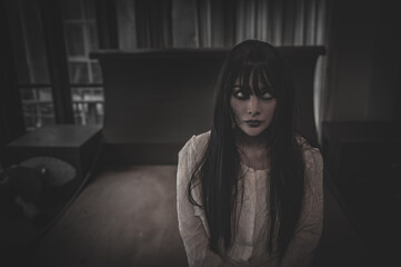 Portrait of asian woman make up ghost,Scary horror scene for background,Halloween festival concept,Ghost movies poster