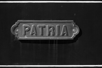 Details of word "patria" (homeland in spanish) in a train wagon in the museum