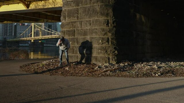 A seamless looping TicTok-style flinger flick clip. Available in both horizontal and vertical video. Shot in downtown Pittsburgh, Pennsylvania.  	