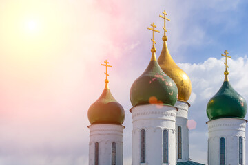 Russian Christian Orthodox church with domes and a cross against the sky. Russian Orthodoxy and...