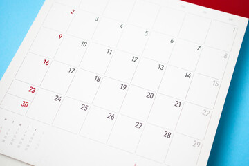calendar page on blue background business planning appointment meeting concept
