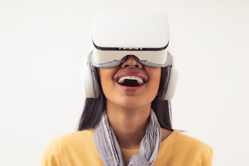 Portrait of Asian girl wearing virtual reality headset with big smile and excited, isolated on white background