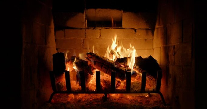 Burning fireplace in cabin, close up