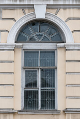  Windows in the city in the old style, with stucco, decorative elements