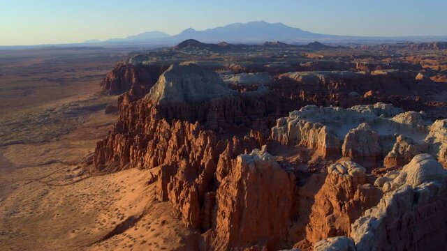 Aerial view of desert mountains in Goblin Valley, wide