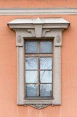  Windows in the city in the old style, with stucco, decorative elements