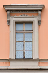  Windows in the city in the old style, with stucco, decorative elements