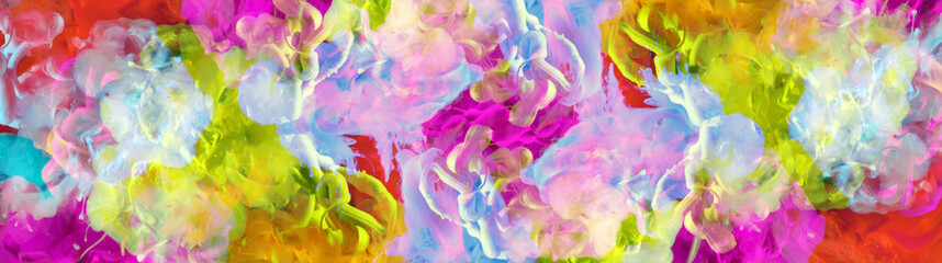 Abstract rainbow smoke long horizontal background. Acrylic colors in water. Ink blots.