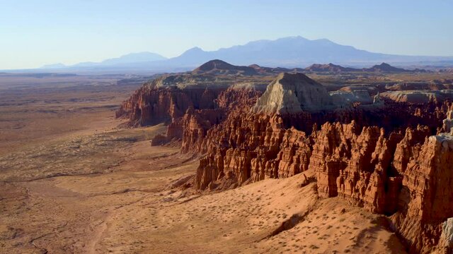 Cliffs in Goblin Valley desert, wide aerial