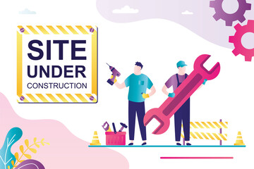 Site under construction, landing page template. Two repairmen with huge wrench and drill. Service man in uniform.