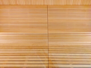Interior of the wooden sauna - detail of the bench