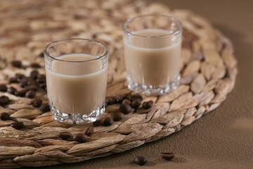 Short glasses of Irish cream Liquor or Coffee Liqueur with coffee beans