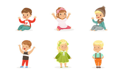 Obraz na płótnie Canvas Cute Adorable Kids Set, Cheerful Boys and Girls Dressed Bright Casual Clothes Cartoon Vector Illustration