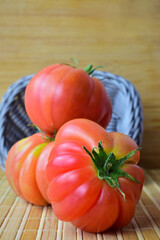 Close up. Monterosa tomatoes, traditional flavor, colorful and with its good properties. Copy space.