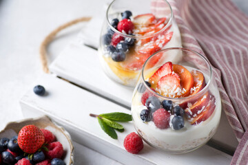 dessert in a glass with yogurt berries and jam