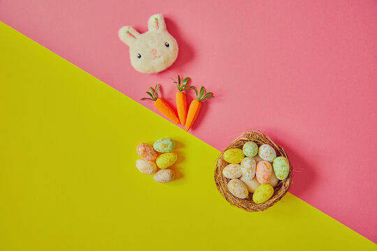 Easter eggs on the yellow -pink background. Happy Easter. Holiday concept.