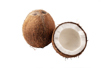 Ripe whole and half coconut isolated on white background.