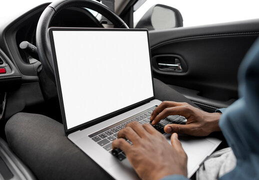 Man Using Laptop in Car Mockup