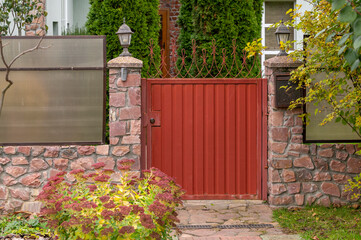 a metal gate in front of the entrance to a private area and a metal fence