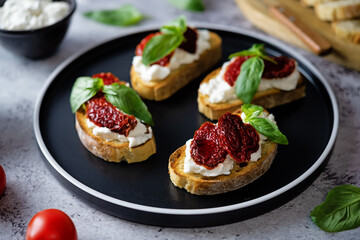 Ricotta dried tomato Basil bruschetta
