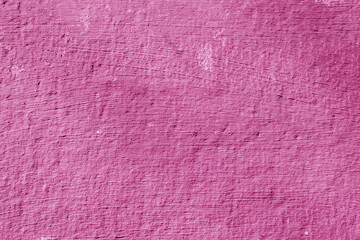 Texture of rough pink plaster. Architectural abstract background.