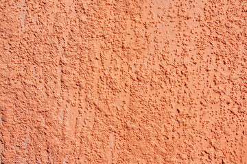 Fototapeta premium Texture of rough beige plaster. Architectural abstract background.