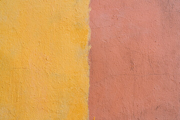 Texture of rough yellow plaster. Architectural abstract background.