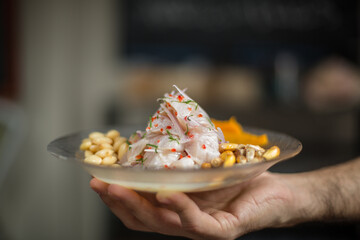The flavor of Ceviche is the tangy taste of lime, with a bit of garlic and spice mixed in. For the typical American, Peruvian ceviche will blast your mouth with what seems like a thousand new flavors 