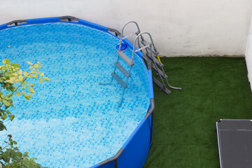 ground pool in the backyard
