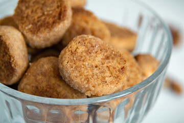 Homemade cookies are in a bowl. Close-up