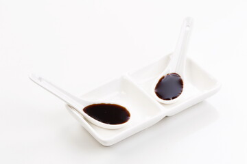 Soy sauce on white background