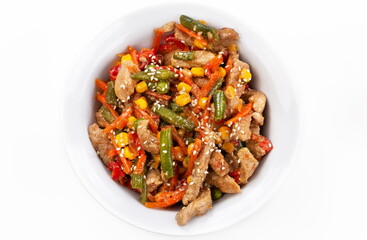 Meat with vegetables and sesame seeds 