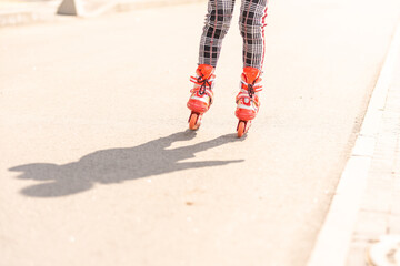 Young happy skater trying exciting outdoor activity