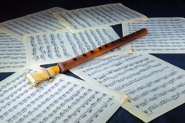 Handmade musical woodwind instrument from Armenia, which is called duduk or tsiranapogh on sheet music with scores