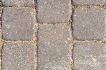 Paving slabs close up, texture of concrete paving stone, stone background