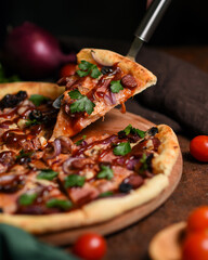 a slice of hot pizza on a metal spatula. round italian pizza with smoked sausages, cheese, fresh herbs and tomato sauce on a dark background