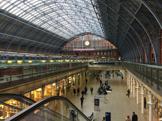 Interior of St Pancras International - a central London railway terminus on Euston Road in the London Borough of Camden. The Eurostar train platform can be seen at left.