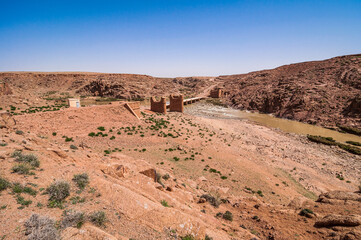 Ruins of old bridge over river Moulouya between Zaida and Aouli in Morocco