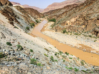 Orange River Moulouya (Oued) around Aouli mines near Midelt in Morocco after rain