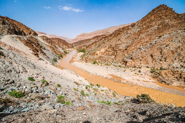 Orange River Moulouya (Oued) around Aouli mines near Midelt in Morocco after rain