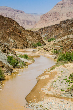 Orange River Moulouya (Oued) around Aouli mines near Midelt in Morocco after rain