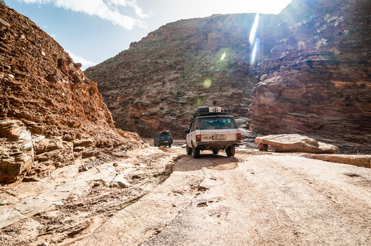 Aouli, Morocco - April 10, 2015. Two old Range Rover Classics in valley of mines near Midelt