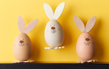 Naklejka na ściany i meble three bunny shaped easter eggs
