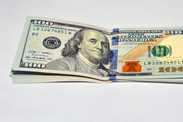 stack of 100 dollars, one hundred American dollars background, selective focus, united states...