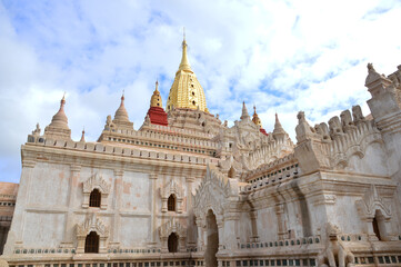 Fototapeta na wymiar A corner of Ananda pagoda's exterior under the sunlight of a cloudy day in Bagan, Myanmar