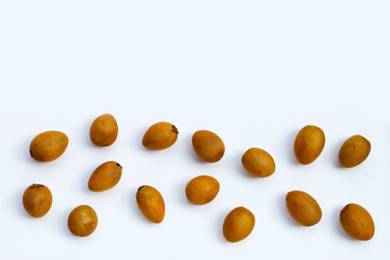 Fresh half sapodilla fruit and whole isolated on white background.