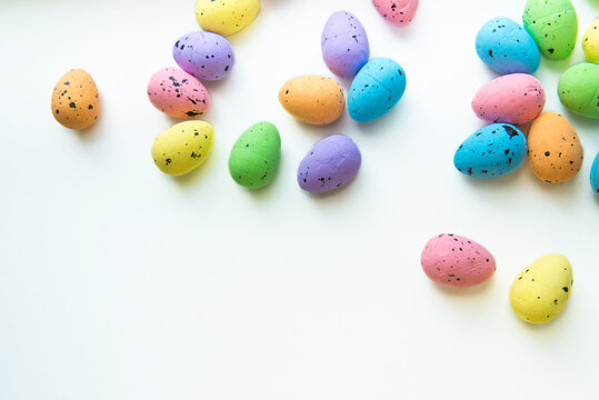 Multicolored Easter eggs on a white background. Decorative easter eggs. Happy Easter concept. Preparation for holiday.