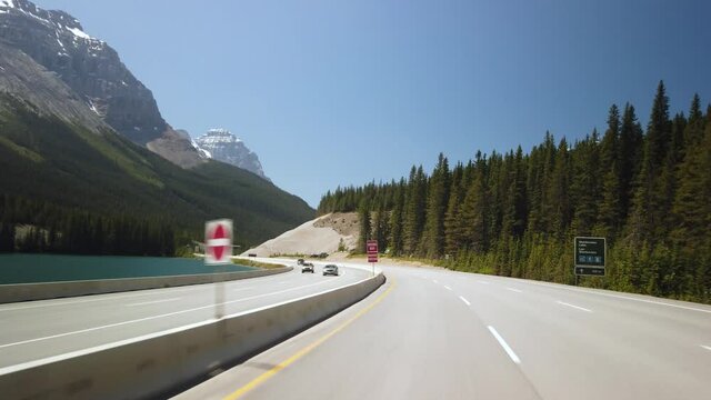 YOHO NATIONAL PARK, BC, CANADA - JULY 2019: Smooth Gimbal Driving on Highway of Yoho National Park in British Columbia, Canada